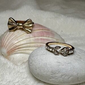 Set of 2 Rings: Bow Size 8 Gold Tone and Jewelry Storm Adjustable Crystal Arrow